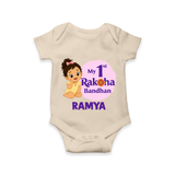 My First Raksha Bandhan Baby Girl Romper – girl sitting with Rakhi theme. - IVORY - New Born (Chest 14")