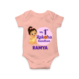 My First Raksha Bandhan Baby Girl Romper – girl sitting with Rakhi theme. - PEACH - New Born (Chest 14")