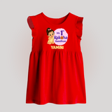 My First Raksha Bandhan Baby Girl Baby Frock – girl sitting with Rakhi theme. - RED - 0 - 3 Months Old (Chest 17")