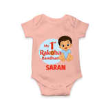 My First Raksha Bandhan Baby Boy Romper – boy sitting with Rakhi theme. - PEACH - New Born (Chest 14")