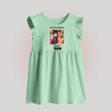 My First Rakhi Baby Girl Cute Graphic Baby Frock – baby with my first rakhi illustration. - MINT GREEN - 0 - 3 Months Old (Chest 17")
