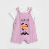 First Rakhi CelebrationBrother Sister Print Dungaree – simple baby holding rakhi illustration. - BABY PINK - 0 - 5 Months Old (Chest 18")