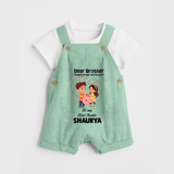 First Rakhi CelebrationBrother Sister Print Dungaree – simple baby holding rakhi illustration. - MINT GREEN - 0 - 5 Months Old (Chest 18")