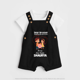 First Rakhi CelebrationBrother Sister Print Dungaree – simple baby holding rakhi illustration. - BLACK - 0 - 5 Months Old (Chest 18")