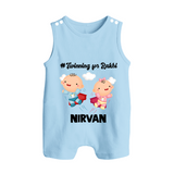 Twinning for Rakhi Print Button Romper – two baby superheroes flying together. - BABY BLUE - New Born (Chest 18")