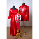 Family outfit set in vibrant red satin featuring mom’s gown, dad’s modern shirt, and child’s playful waistcoat and trousers. Perfect for festive occasions and Christmas.