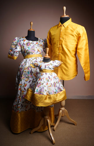 Yellow Temple Border & Illustrated Floral Family Outfit Set – Printed Gown, Silk Shirt & Baby Dress Combo