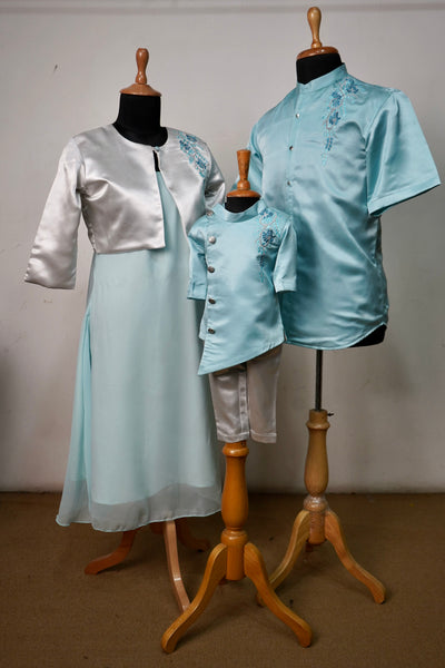 Aqua blue and silver coordinated family outfit with embroidery – mom dress, dad kurta shirt, and baby boy kurta set