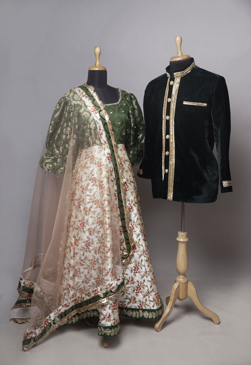 Elegant bottle green and ivory floral couple ethnic wear set with velvet sherwani and lehenga by Anveshana Clothing
