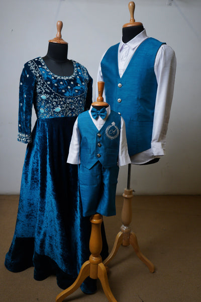 Family matching royal blue outfit – embroidered velvet gown for mom, Nehru jacket for dad, and baby boy vest set