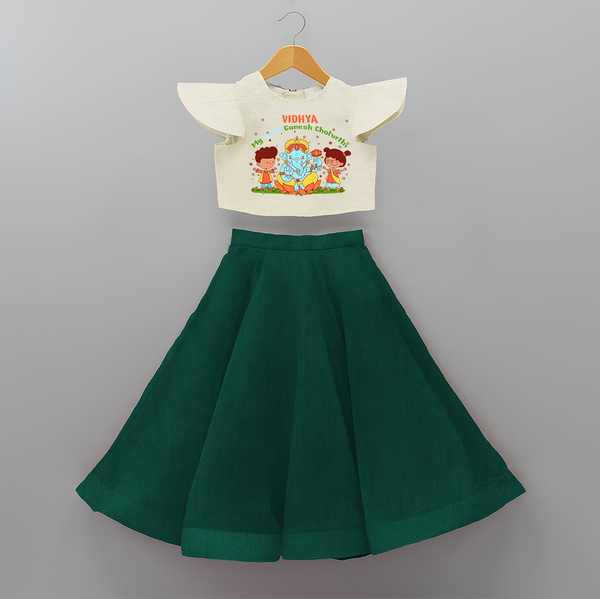 My First Ganesh Chaturthi With My Ganesha - Customized Crop Top And Skirt For Kids - BOTTLE GREEN - 6 - 9 Months Old (Chest 20" , Frock Waist 20")