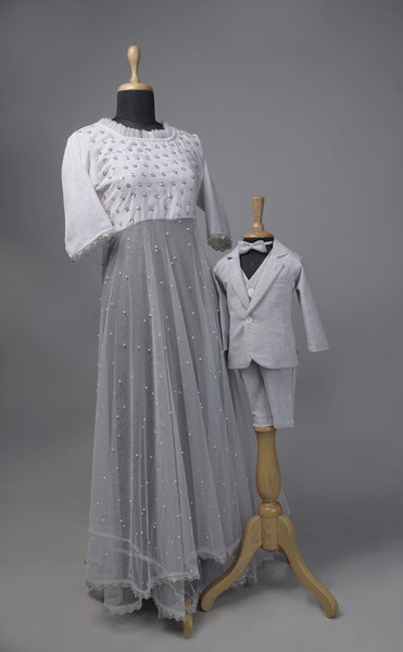 Elegant grey mom and son coordinated partywear set with embellished mom’s gown and matching grey 3-piece suit for baby boy.