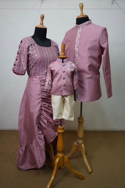 Mauve silk family coordinated outfit set with embroidery – includes mom’s gown, dad’s kurta, and boy’s ethnic kurta-pant set