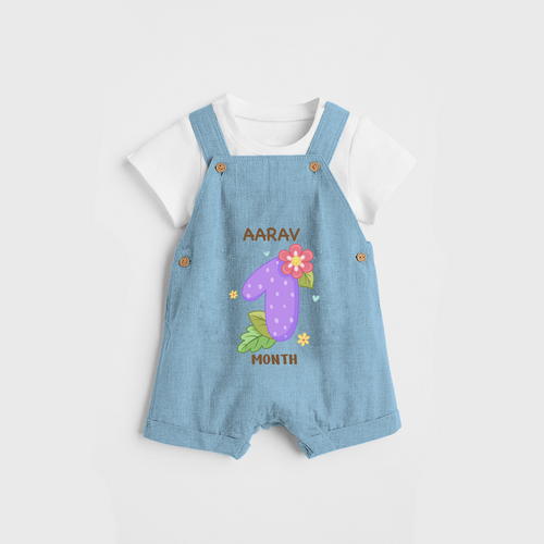 Memorialize your little one's first month with a personalized Dungaree