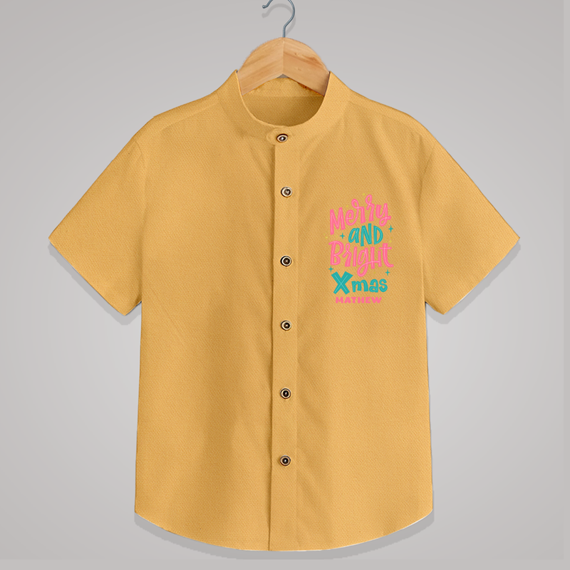 "Merry And Bright Xmas" - Christmas Themed Kids Shirt With Customized name - PASTEL YELLOW - 0 - 6 Months Old (Chest 23")