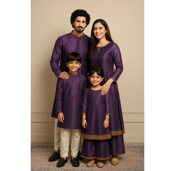 Indian family wearing coordinated raw silk ethnic outfits with golden lace detailing — dad in kurta, mom in Anarkali set, son in kurta, and daughter in frock and palazzo — festive family ethnic wear set.