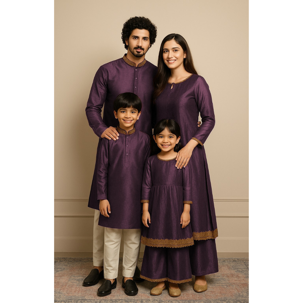Indian family wearing coordinated raw silk ethnic outfits with golden lace detailing — dad in kurta, mom in Anarkali set, son in kurta, and daughter in frock and palazzo — festive family ethnic wear set.