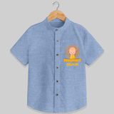 Elevate the joyous spirit with our "Mahavir's Little Disciple" Customised Kids Shirt - BLUE CHAMBREY - 0 - 6 Months Old (Chest 21")