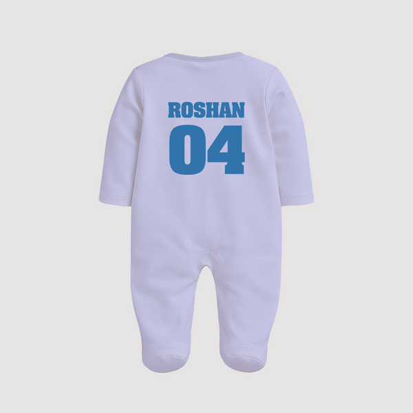 The 1996 Throwback Sleep Suit - A nod to the iconic light blue and yellow design.