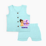 My First Raksha Bandhan Baby Girl Jabla – girl sitting with Rakhi theme. - BABY BLUE - 0 - 3 Months Old (Chest 9.8")