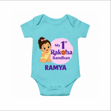 My First Raksha Bandhan Baby Girl Romper  – girl sitting with Rakhi theme. - ARCTIC BLUE - New Born (Chest 14")