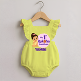 My First Raksha Bandhan Baby Girl Romper Frock – girl sitting with Rakhi theme. - PASTEL YELLOW - 0 - 3 Months Old (Chest 19")
