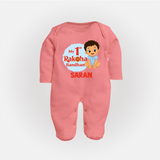 My First Raksha Bandhan Baby Boy Fullbody Suit– boy sitting with Rakhi theme. - PEACH - New Born (Chest 7.5")