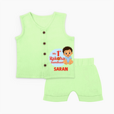 My First Raksha Bandhan Baby Boy Jabla– boy sitting with Rakhi theme. - PASTEL GREEN - 0 - 3 Months Old (Chest 9.8")