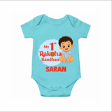 My First Raksha Bandhan Baby Boy Romper – boy sitting with Rakhi theme. - ARCTIC BLUE - New Born (Chest 14")