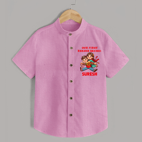Our First Raksha Bandhan Sibling Shirt – brother & sister holding Rakhi. - BABY PINK - 0 - 6 Months Old (Chest 23")