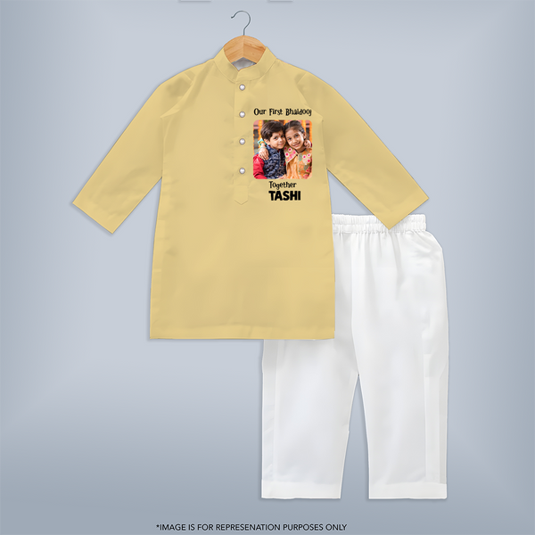 My First Rakhi Baby Girl Cute Graphic Kurta – baby with my first rakhi illustration. - PASTEL YELLOW - 3 - 6 Months Old (Chest 24", Kurta Length 14'', Waist 19", Pant Length 14")