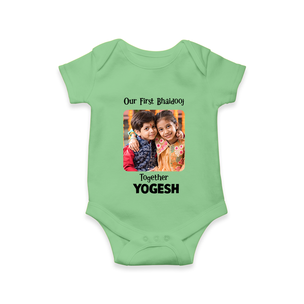 My First Rakhi Baby Girl Cute Graphic Romper  – baby with my first rakhi illustration. - GREEN - New Born (Chest 14")