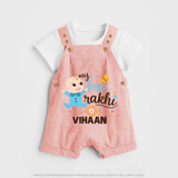 Happy Rakhi Baby Siblings Graphic Dungaree – playful sibling interaction with Rakhi. - PEACH - 0 - 5 Months Old (Chest 18")