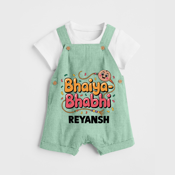Bhaiya-Bhabhi Fun Rakhi Print Dungaree – cartoon style with “Bhaiya-Bhabhi” text and playful elements. - MINT GREEN - 0 - 5 Months Old (Chest 18")