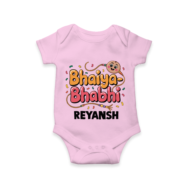 Bhaiya-Bhabhi Fun Rakhi Print Romper  – cartoon style with “Bhaiya-Bhabhi” text and playful elements. - BABY PINK - New Born (Chest 14")