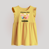 Twinning for Rakhi Print Baby Frock – two baby superheroes flying together. - PASTEL YELLOW - 0 - 3 Months Old (Chest 17")
