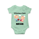 Twinning for Rakhi Print Romper  – two baby superheroes flying together. - MINT GREEN - New Born (Chest 14")