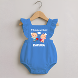 Twinning for Rakhi Print Romper Frock – two baby superheroes flying together.