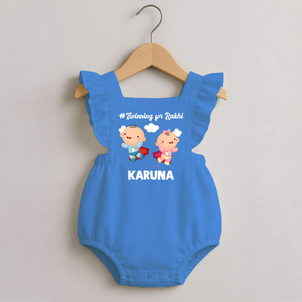 Twinning for Rakhi Print Romper Frock – two baby superheroes flying together.