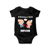 Twinning for Rakhi Print Romper  – two baby superheroes flying together. - BLACK - New Born (Chest 14")