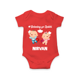 Twinning for Rakhi Print Romper  – two baby superheroes flying together. - RED - New Born (Chest 14")