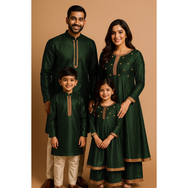Indian family wearing coordinated raw silk ethnic outfits with golden lace detailing — dad in kurta, mom in Anarkali set, son in kurta, and daughter in frock with palazzo — festive family ethnic wear set.