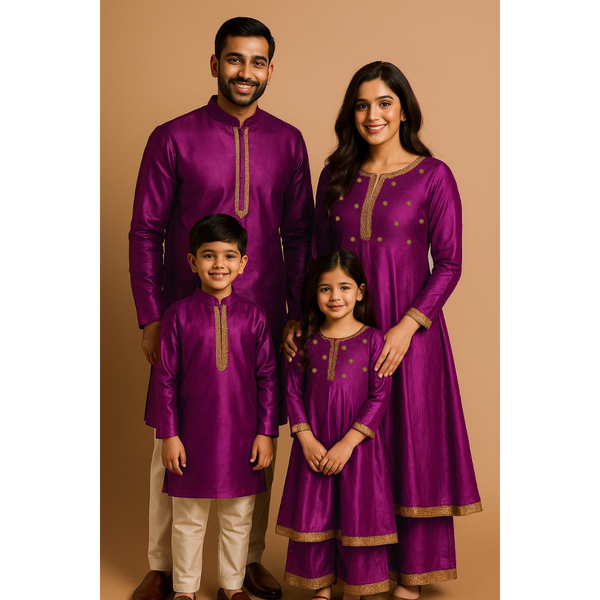 Indian family wearing coordinated raw silk ethnic outfits with golden lace detailing — dad in kurta, mom in Anarkali set, son in kurta, and daughter in frock with palazzo — festive family ethnic wear set.