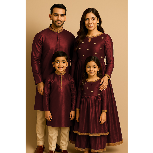 Indian family wearing coordinated raw silk ethnic outfits with golden lace embellishments — dad in kurta, mom in Anarkali set, son in kurta, and daughter in frock — festive family ethnic wear set.