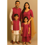 Family wearing coordinated rose pink and cream raw silk ethnic outfits — father, mother, son, and daughter in matching festive Indian attire.