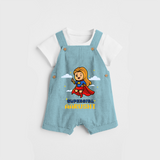 Celebrate The Super Kids Theme With  "Super Girl" Personalized Dungaree set for your Baby - ARCTIC BLUE - 0 - 5 Months Old (Chest 17")