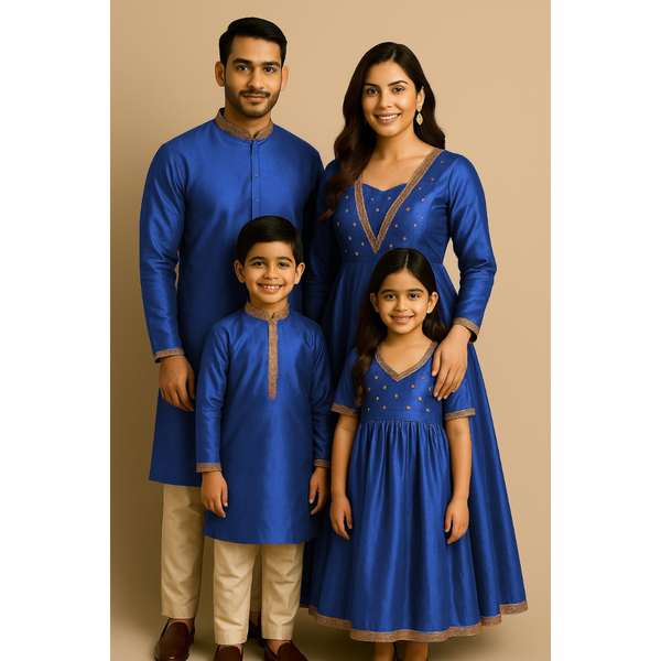 Indian family wearing coordinated raw silk ethnic outfits with golden lace embellishments — dad in kurta, mom in Anarkali set, son in kurta, and daughter in frock — festive family ethnic wear set.