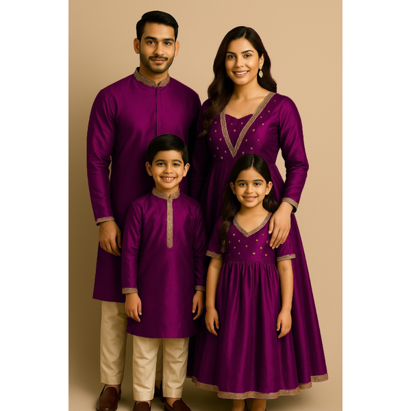 Indian family wearing coordinated raw silk ethnic outfits with golden lace embellishments — dad in kurta, mom in Anarkali set, son in kurta, and daughter in frock — festive family ethnic wear set.
