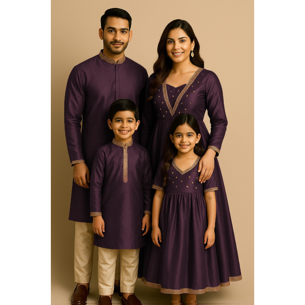 Indian family wearing coordinated raw silk ethnic outfits with golden lace embellishments — dad in kurta, mom in Anarkali set, son in kurta, and daughter in frock — festive family ethnic wear set.
