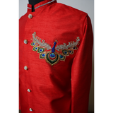 Regal Red Sherwani with Embroidered Peacock Motif